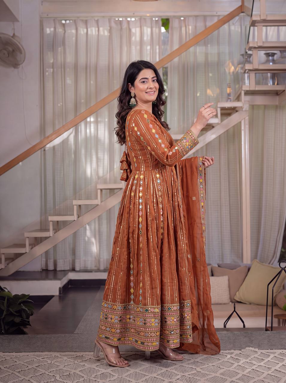 Radiant Rust Orange Flared Anarkali Suit Set Adorned with Multicolored Geometric Embroidery and Dazzling Mirror Work Detailing